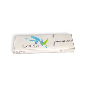 Cigarette pack labeled CAPRI Superslims Menthol with blue-green bird logo, shown at an angle with 'SMOKING KILLS' warning on the right panel